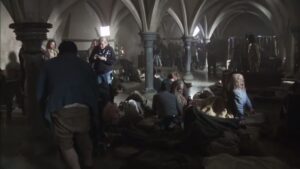 An image of the filming of Poldark in the medieval and vaulted medieval Undercroft at The Bishop's Palace