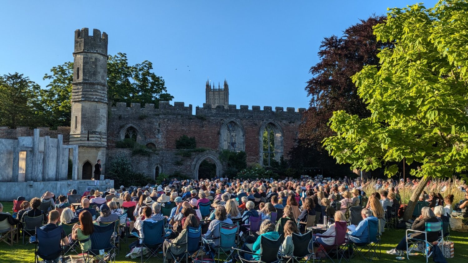An image of an outdoor summer production at The Bishop's Palace in Wells, Somerset.