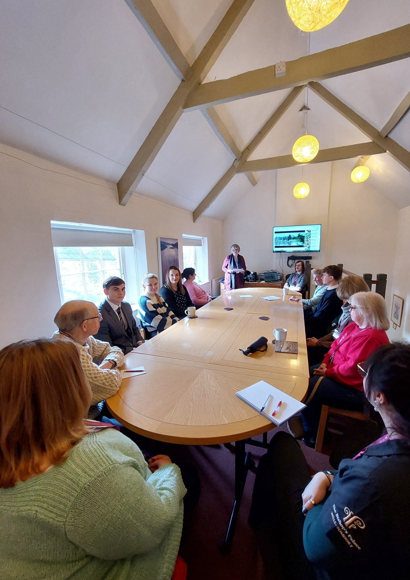 An image of a Wells Dementia Alliance meeting taking place at The Bishop's Palace and Gardens.