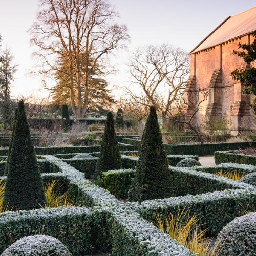 An image of the Knot Garden at The Bishop's Palace in Wells, Somerset.