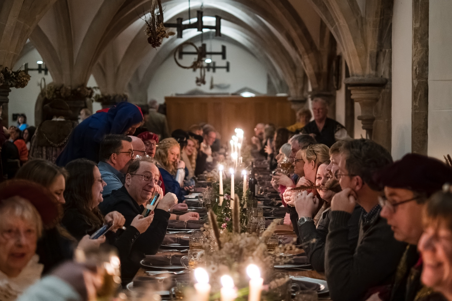 An image of a group enjoying a celebration dinner at The Bishop's Palace, Wells.