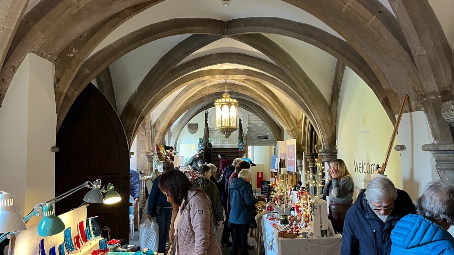 An image of the Christmas Artisan Market taking place at The Bishop's Palace, Wells in Somerset
